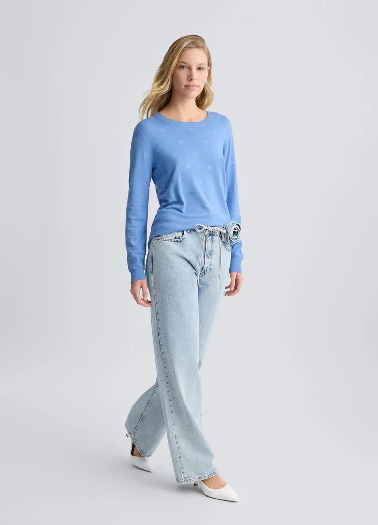 Top with logo and gemstones