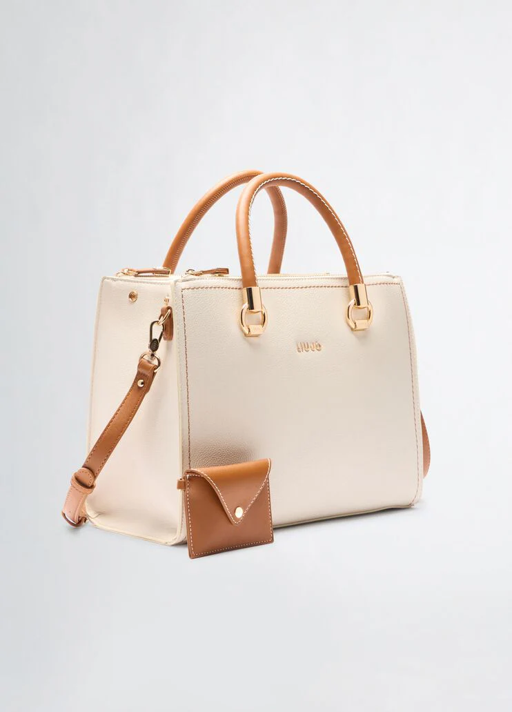 White and brown handbag