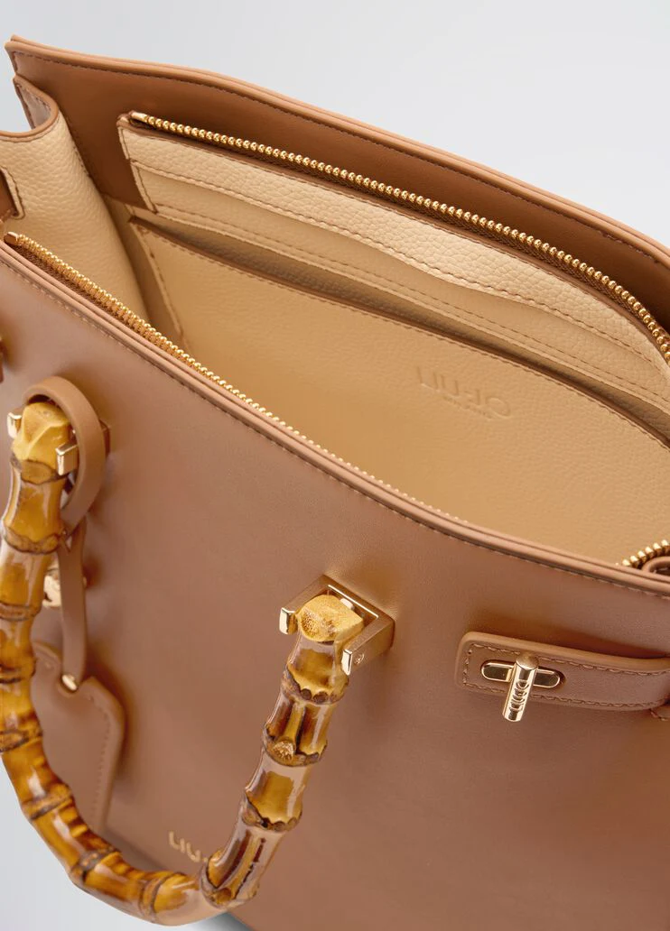 Bag with bamboo-finish handles