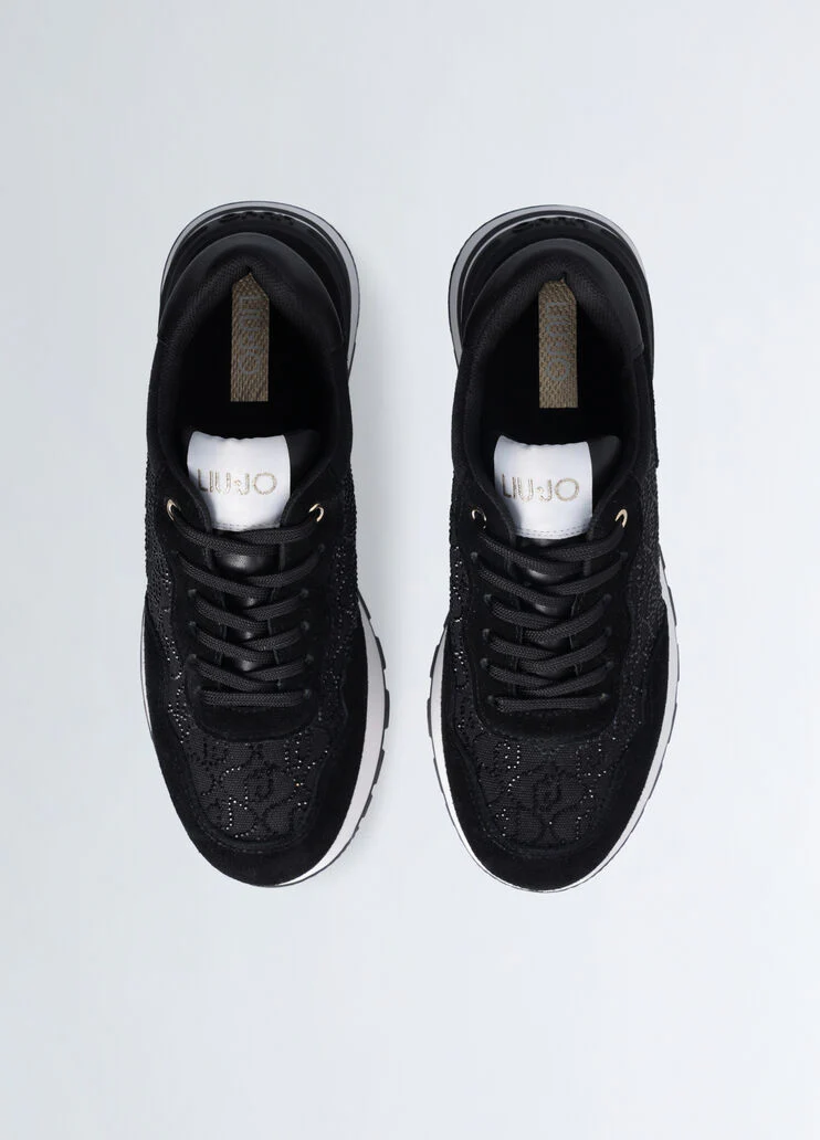 Black sneakers with rhinestone-detailed logo