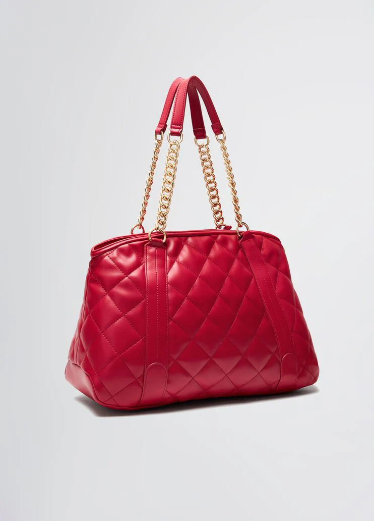 Quilted shopping tote with charm