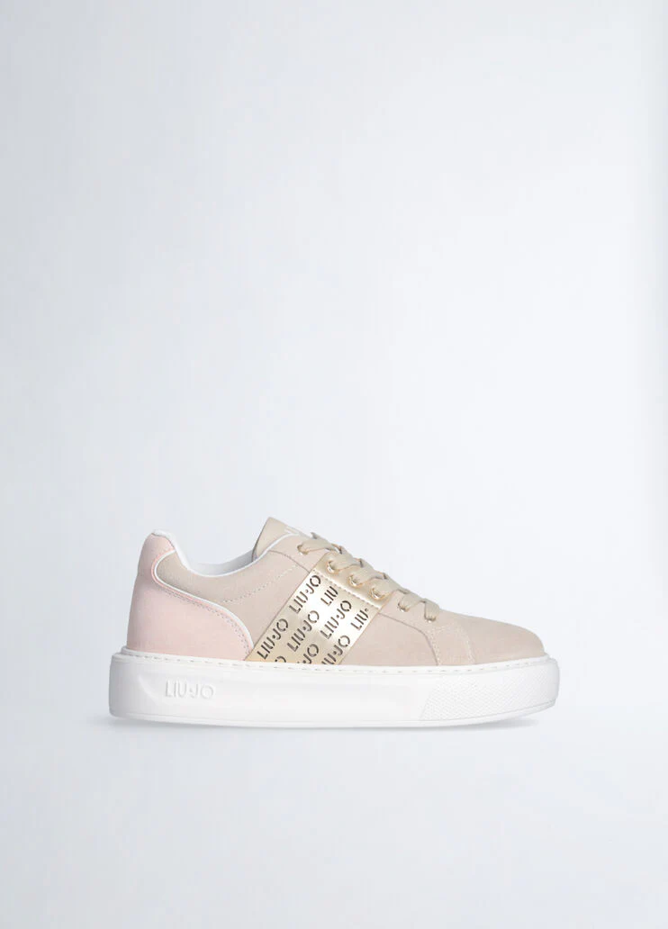 Sneakers with perforated logo