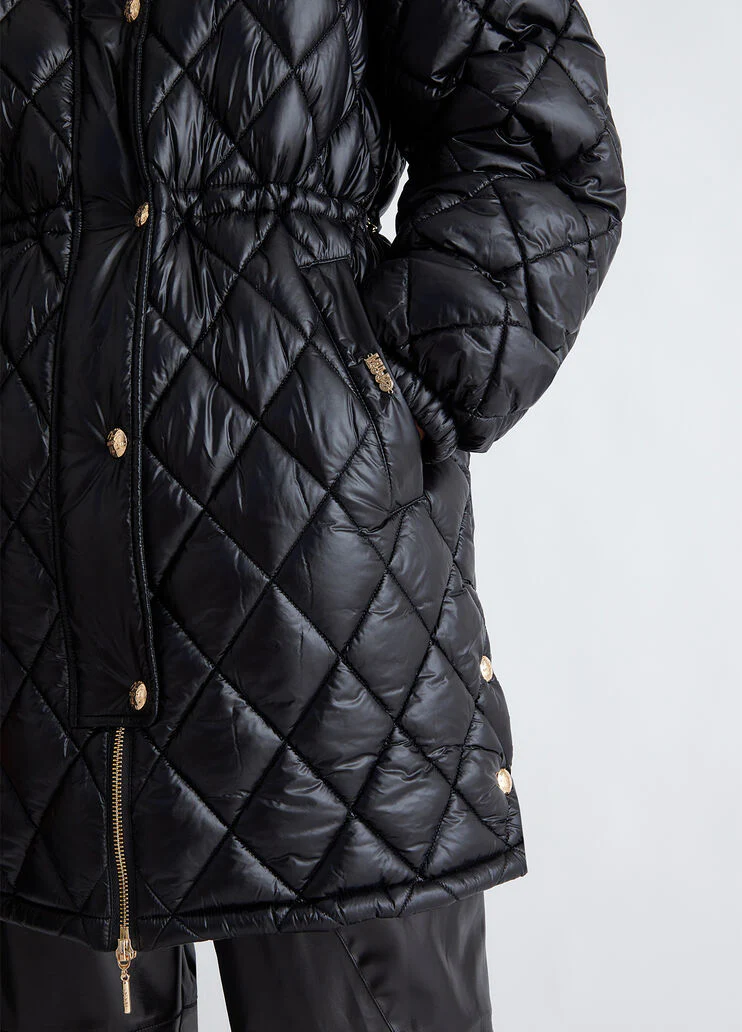 Padded jacket with detachable sleeves
