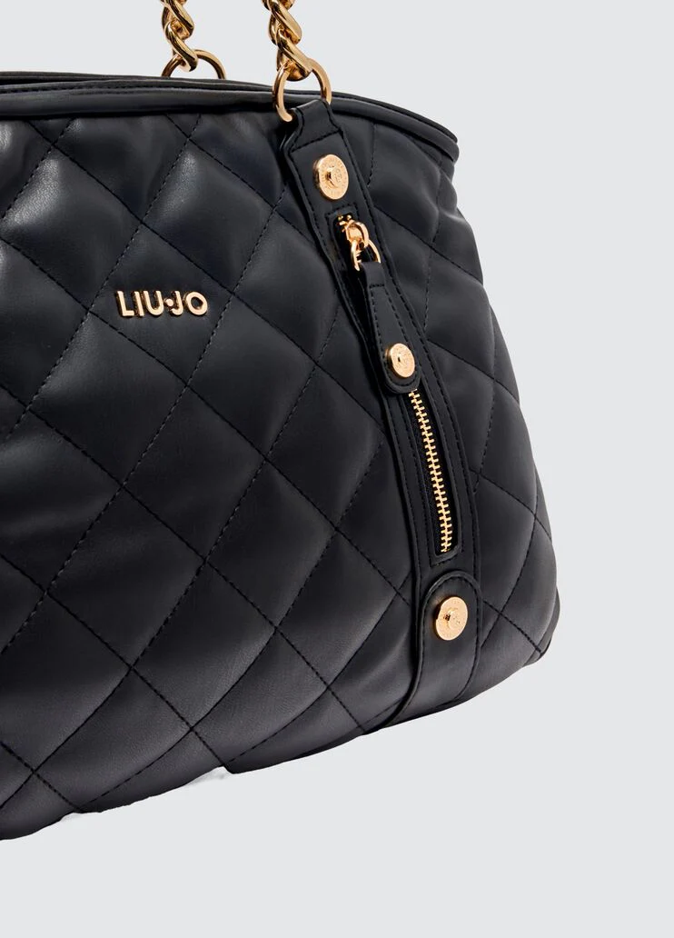 Quilted black handbag