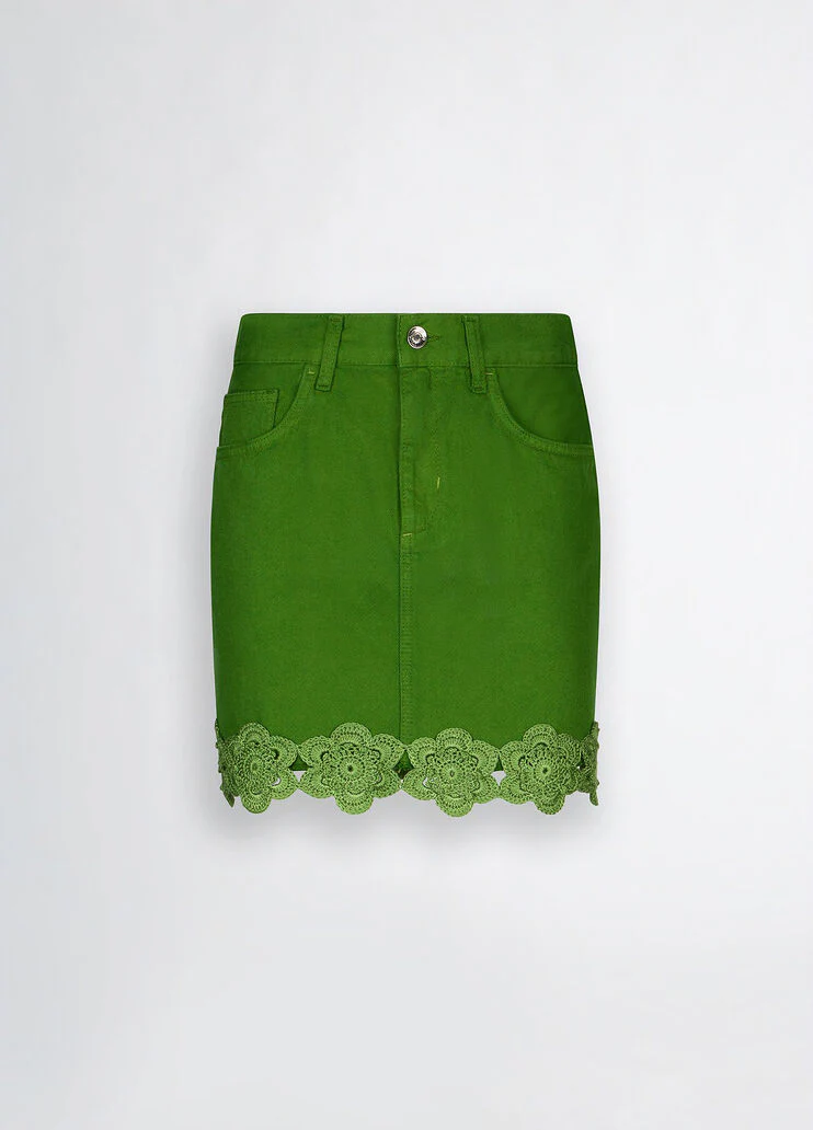Green miniskirt with embroidery