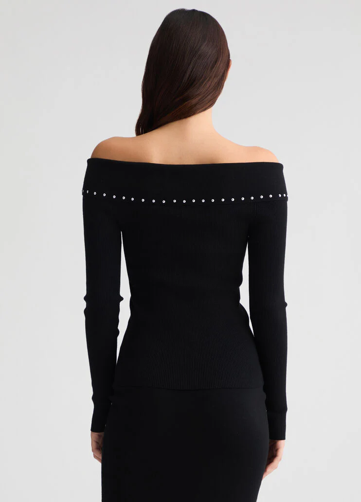 Top with zip and studs