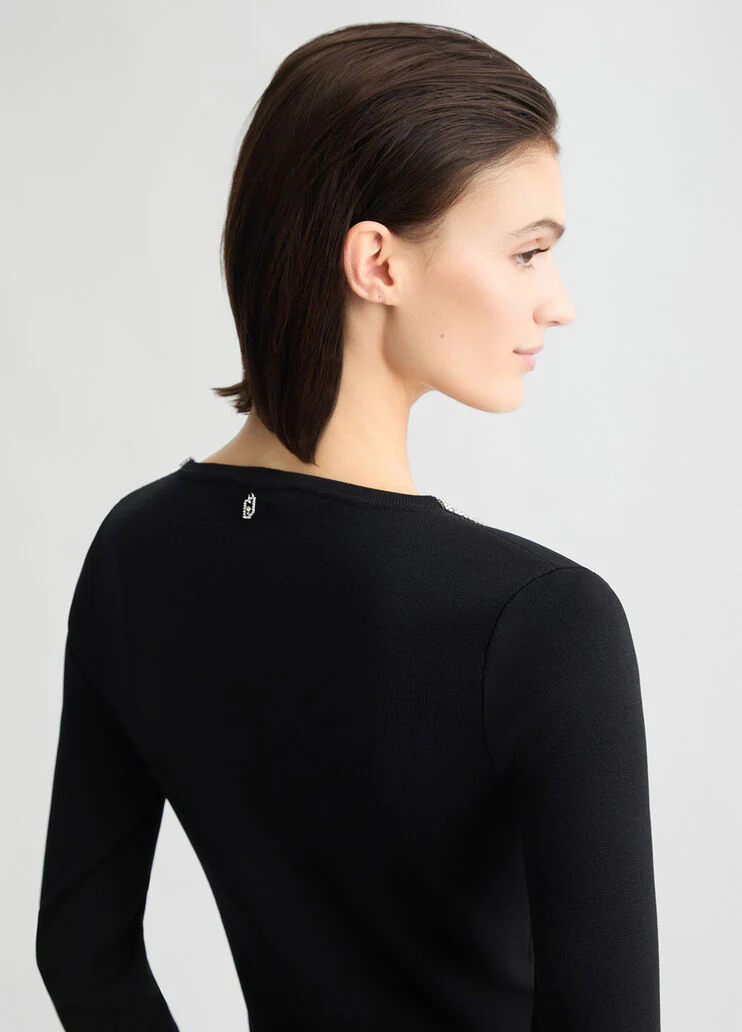 Jumper with gemstones