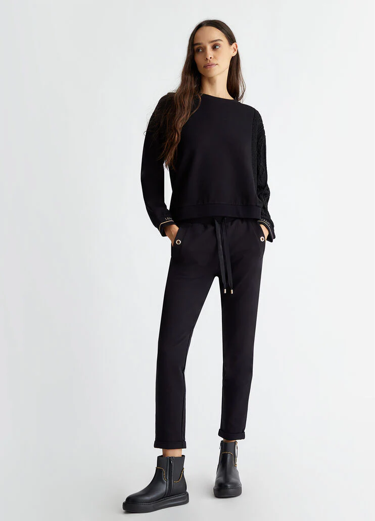 Black sweatshirt with knit insert