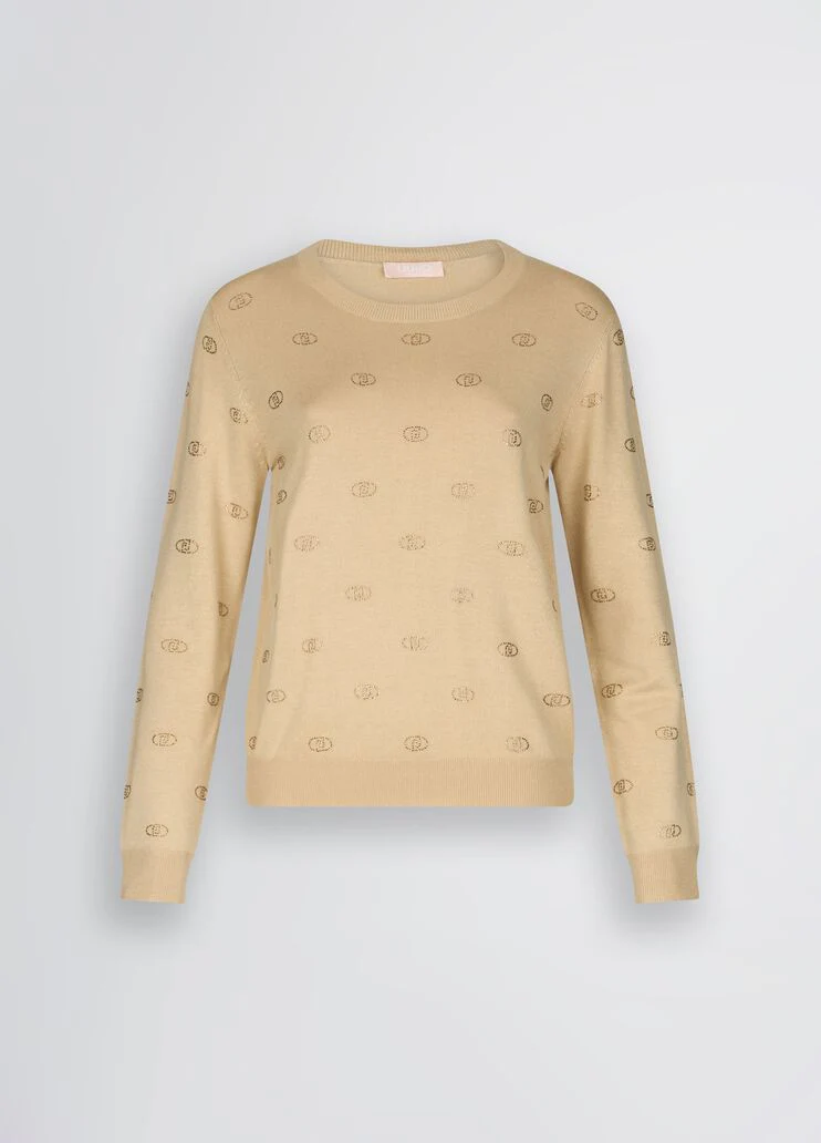 Top with logo and gemstones