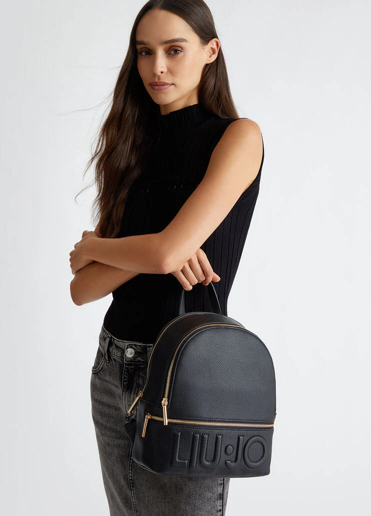 Backpack with logo and charm