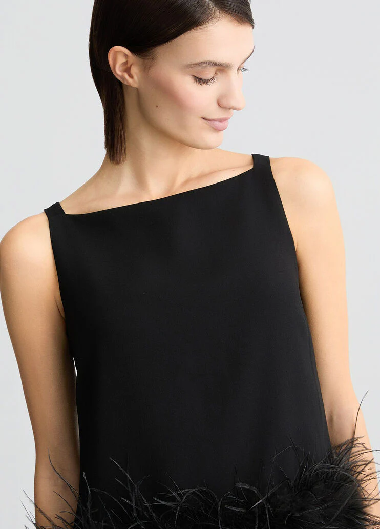 Black top with feathers