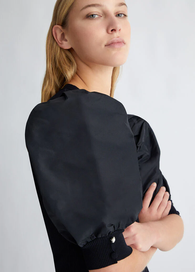 Top with taffeta sleeves