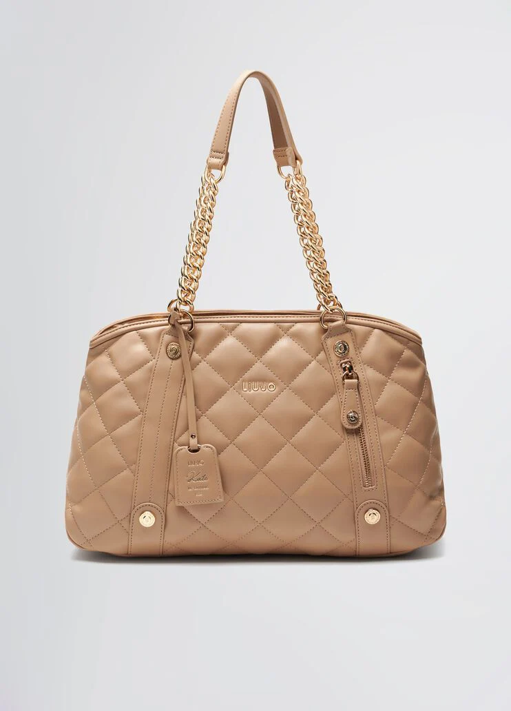 Quilted pink handbag