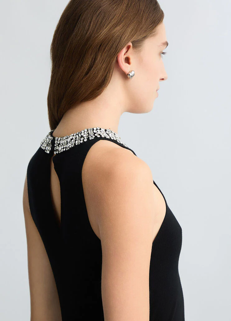 Black top with bejewelled embellishment
