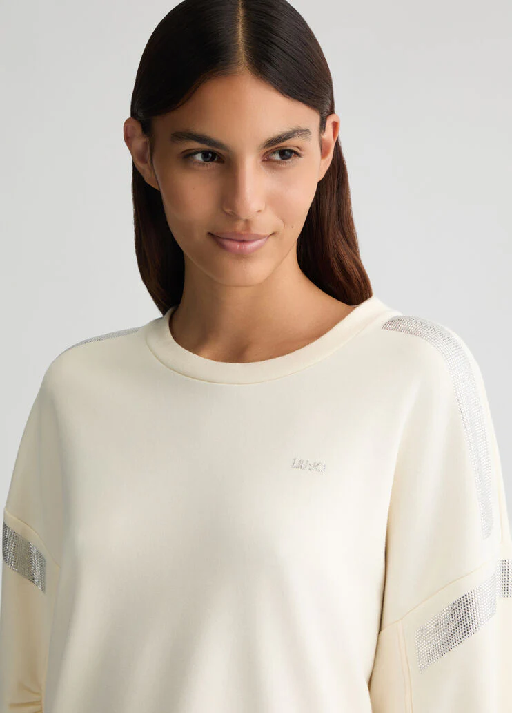 White sweatshirt with rhinestones