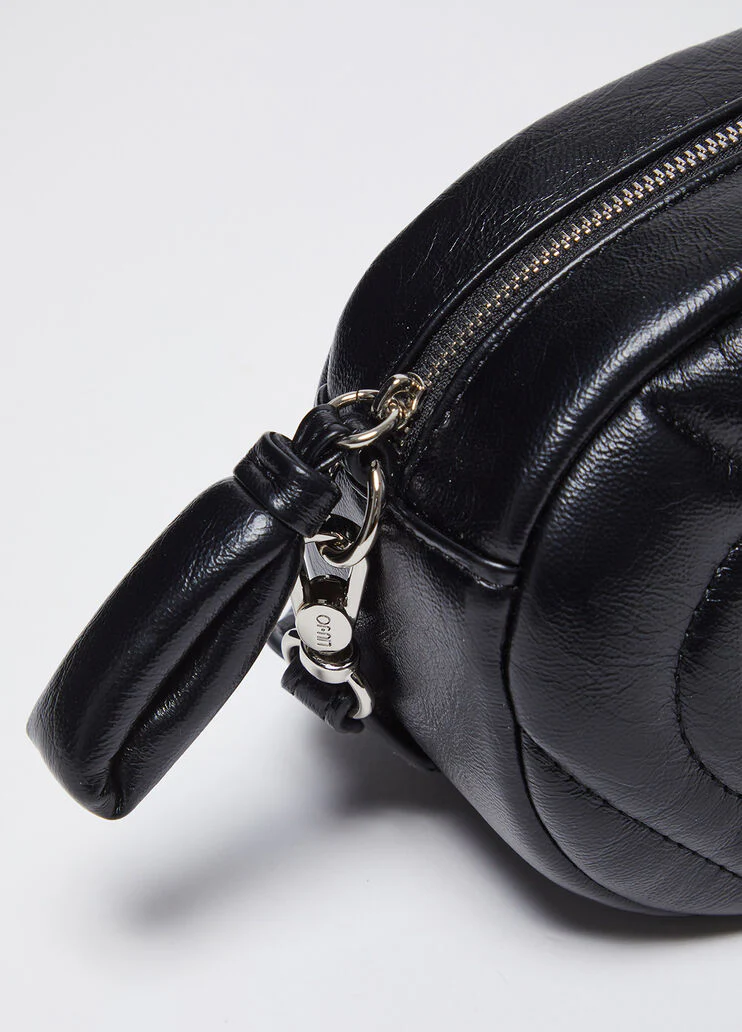 Glossy quilted crossbody bag