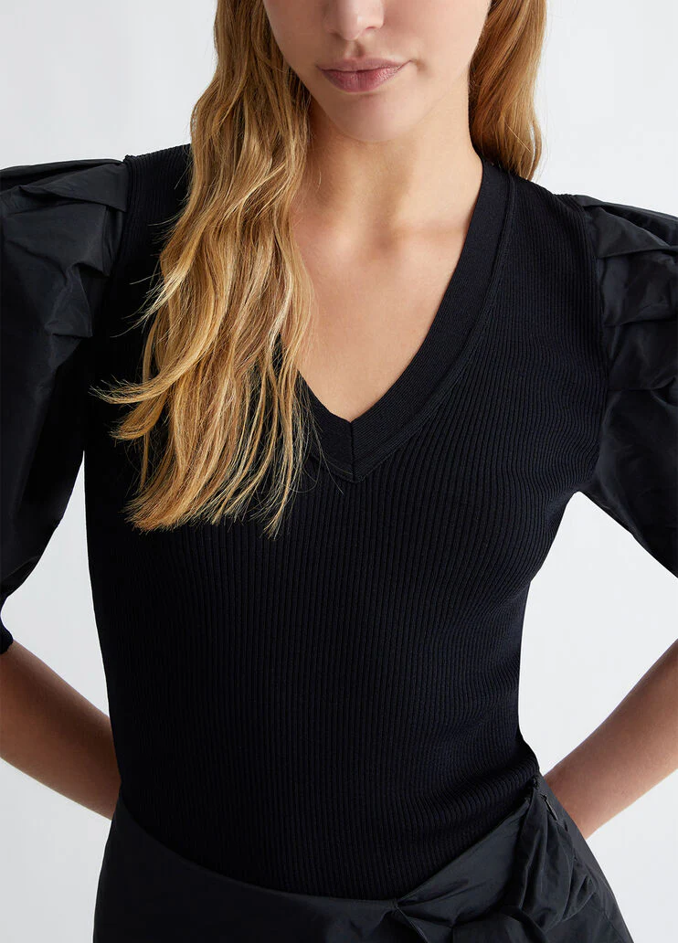 Top with taffeta sleeves