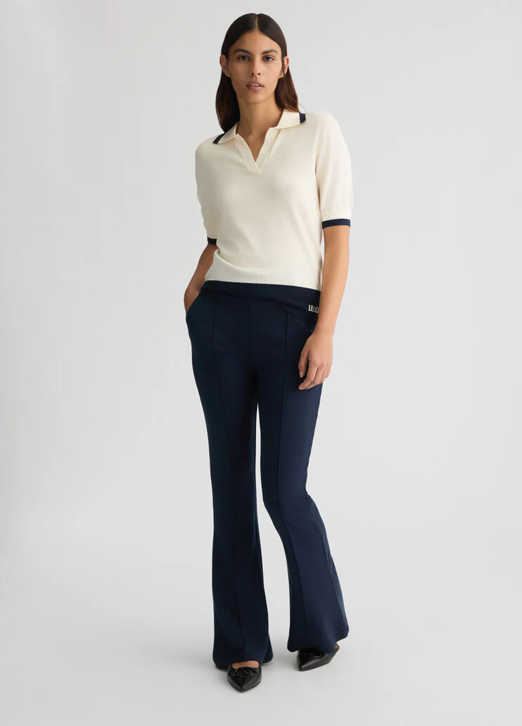 White jumper with details