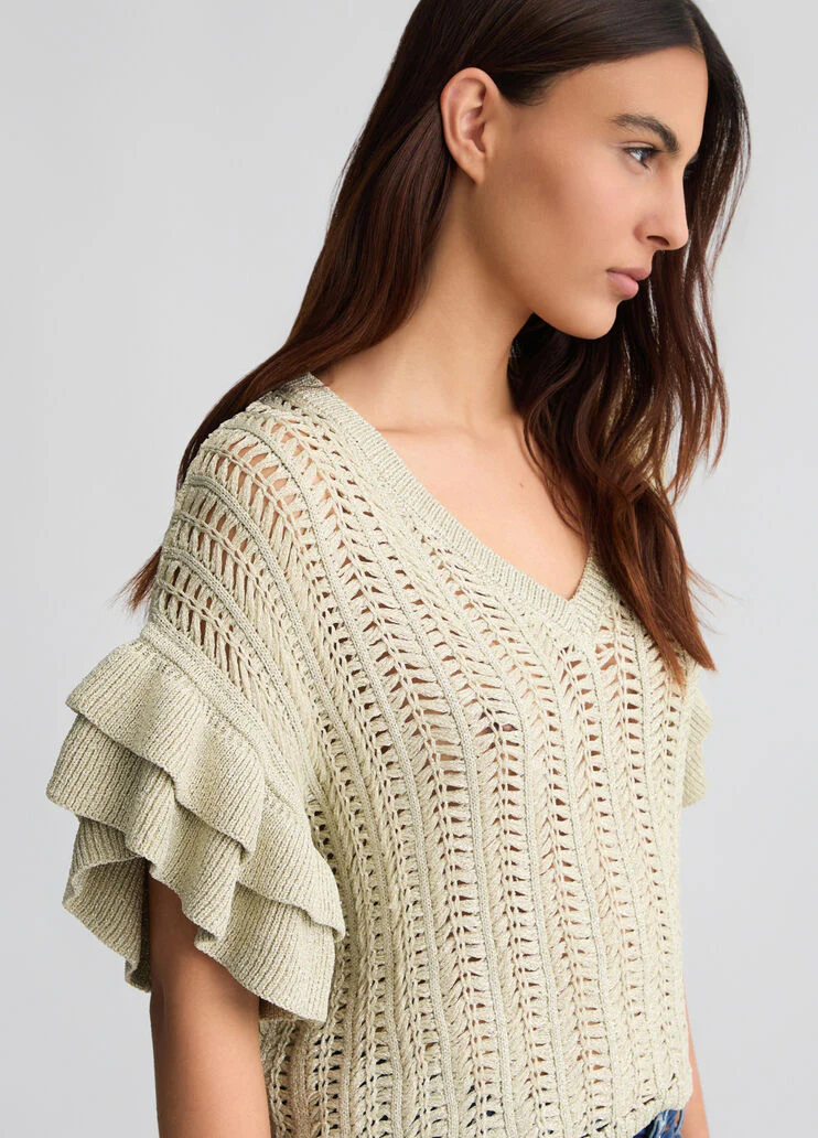 Light gold knit top