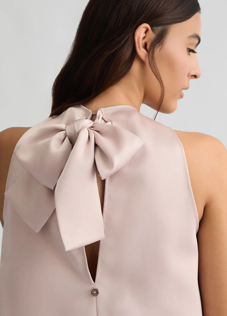 Light pink top with bow