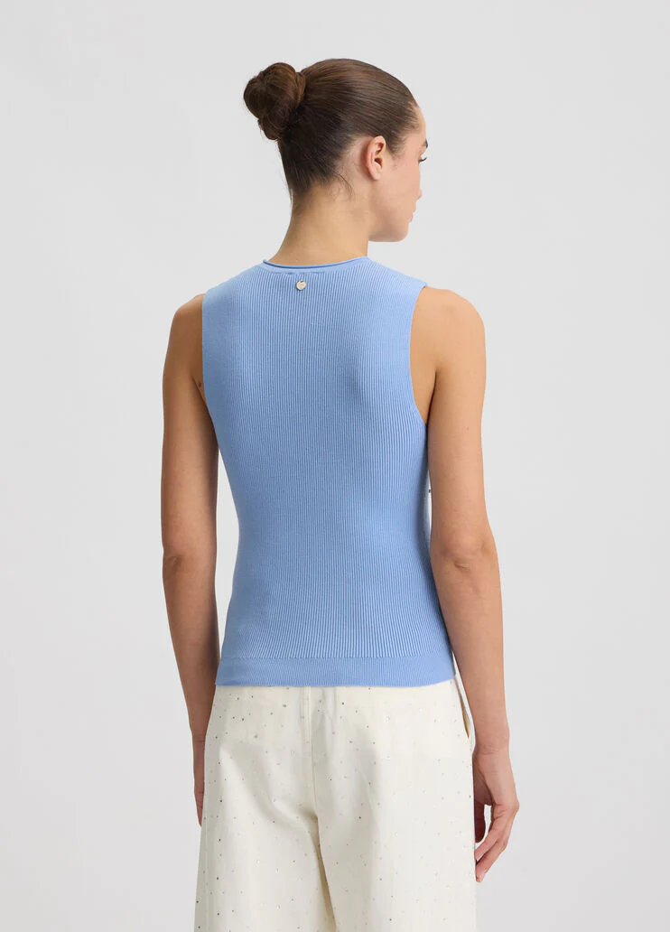 Light blue top with studs