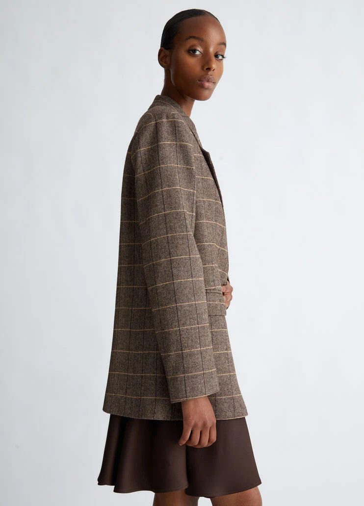 Chequered blazer with bejewelled brooch detail