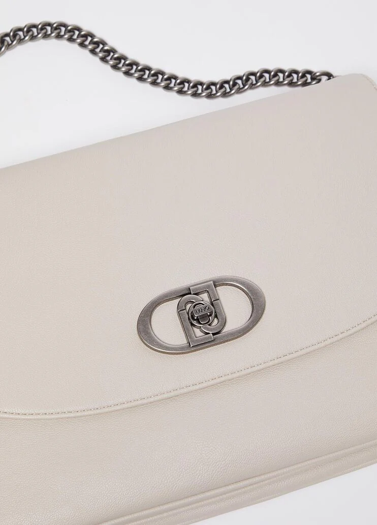 Handbag in coated fabric