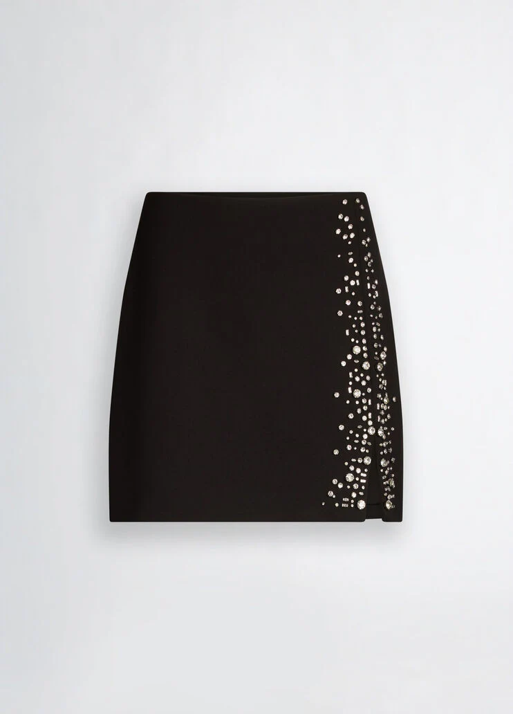 Black mini skirt with bejewelled embellishment