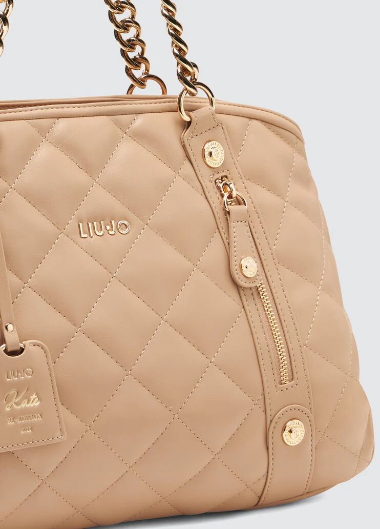 Quilted pink handbag
