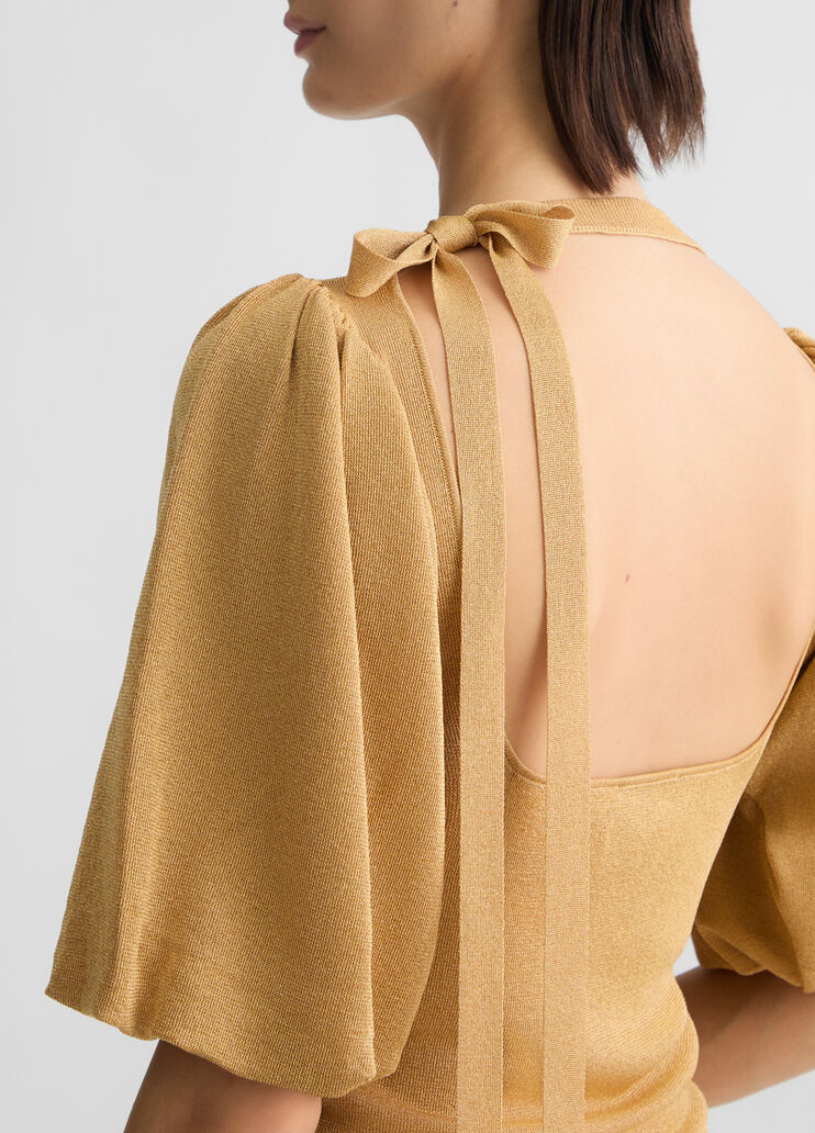 Gold top with cut-out detailing