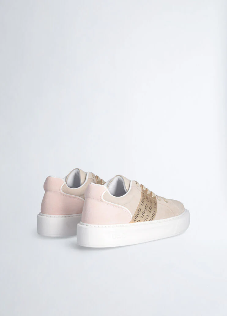 Sneakers with perforated logo