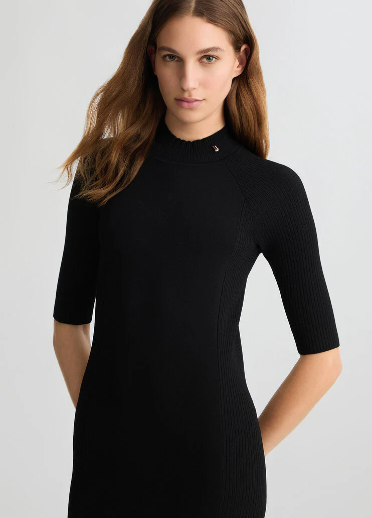 Black knit dress with cut-out
