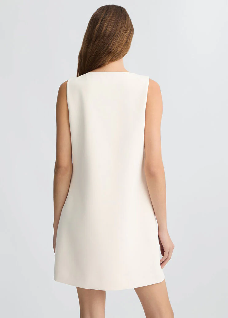 Short champagne-coloured dress with bejewelled embellishment