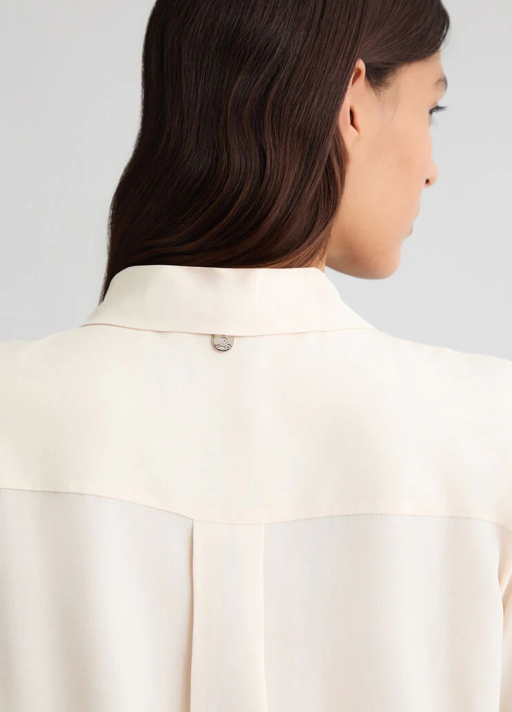 Pleated ivory blouse