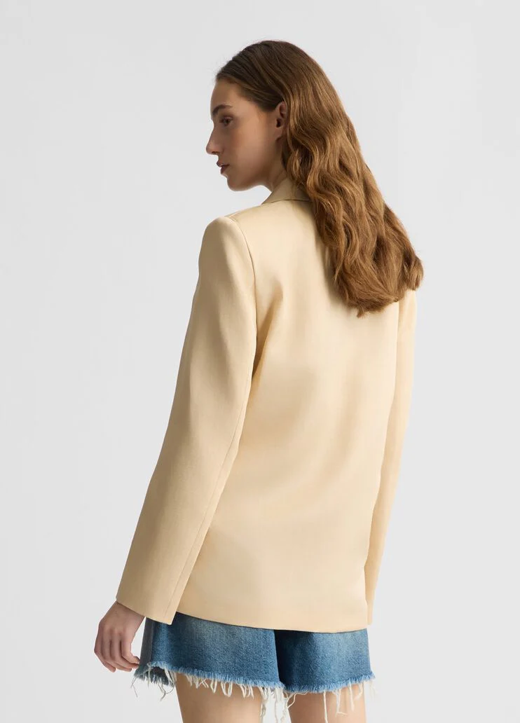 Double-breasted beige blazer