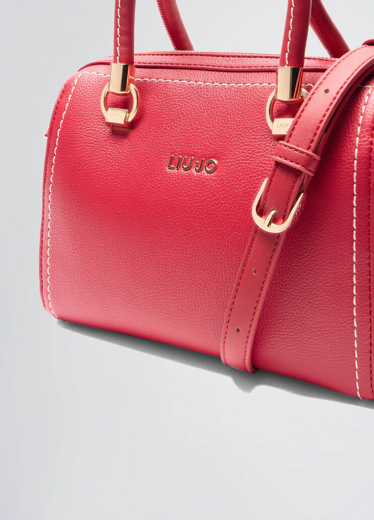 Handbag with matching clutch