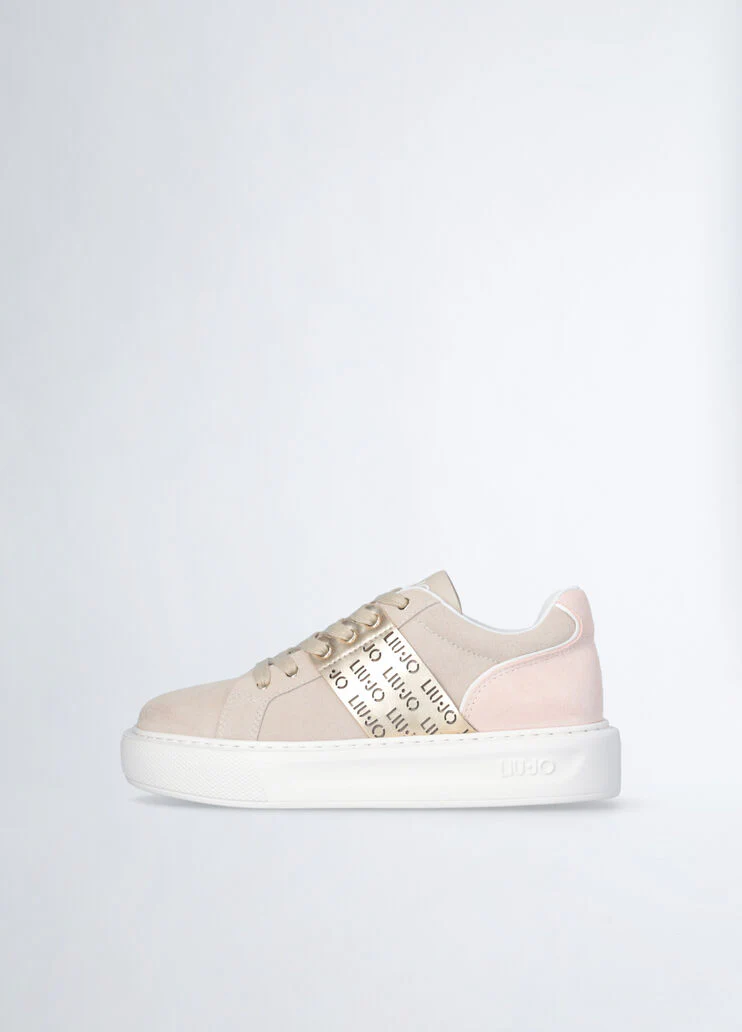 Sneakers with perforated logo