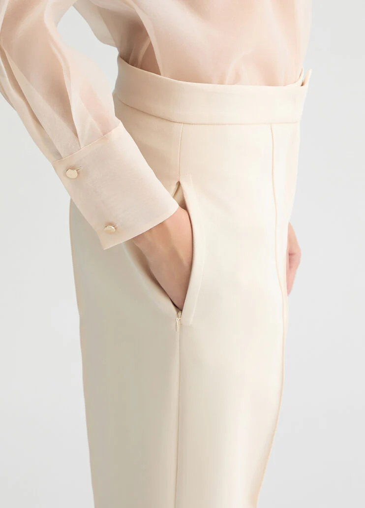 Cream cigarette trousers