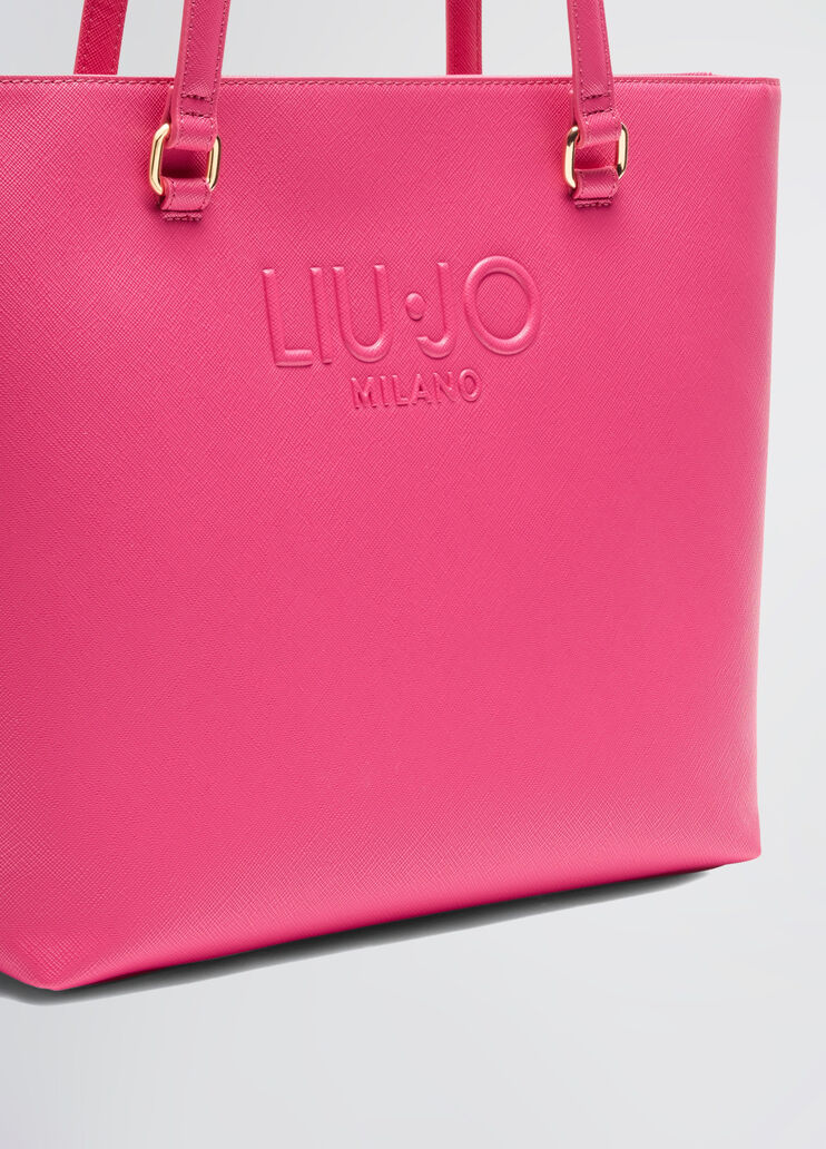 Bright pink shopping bag