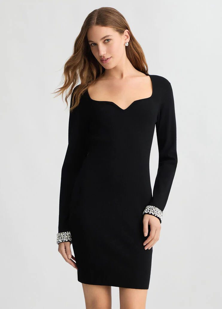 Short black dress with bejewelled embellishment