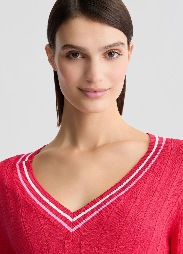 Red V-neck jumper
