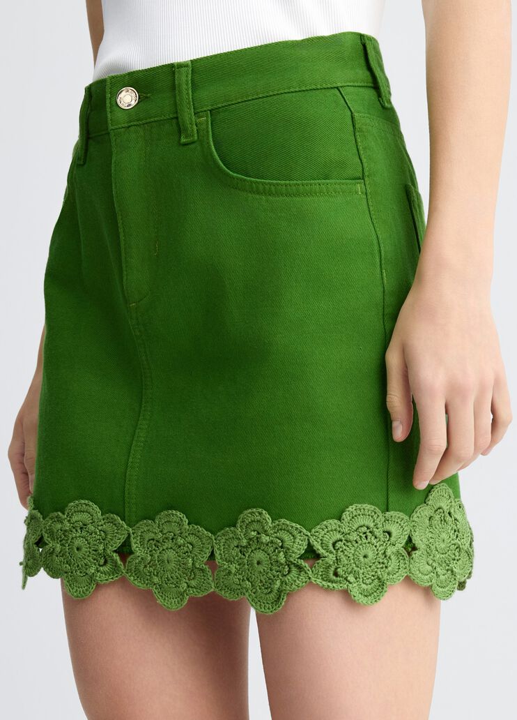 Green miniskirt with embroidery
