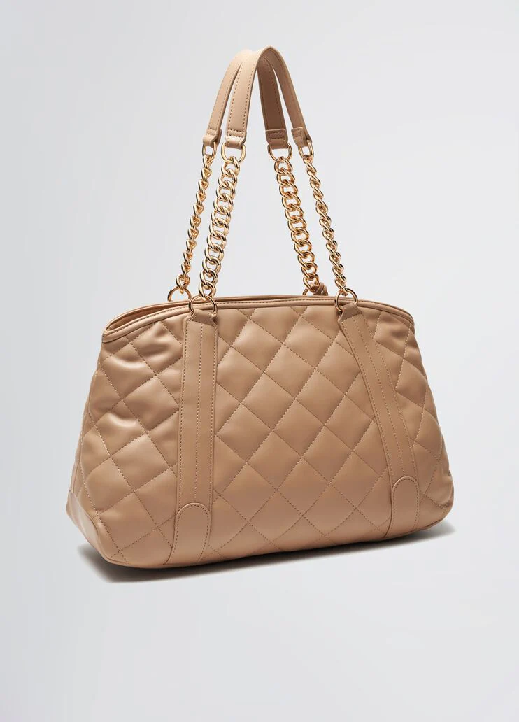 Quilted pink handbag