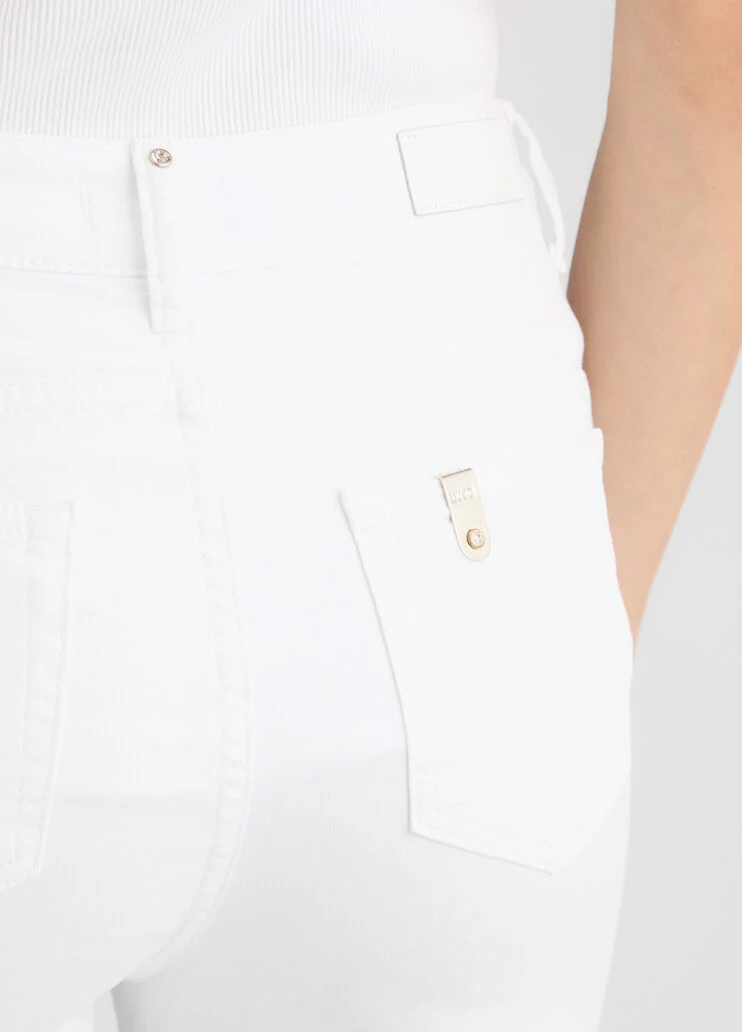 Flared trousers with buttons