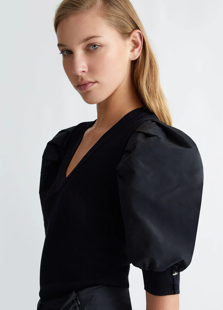 Top with taffeta sleeves