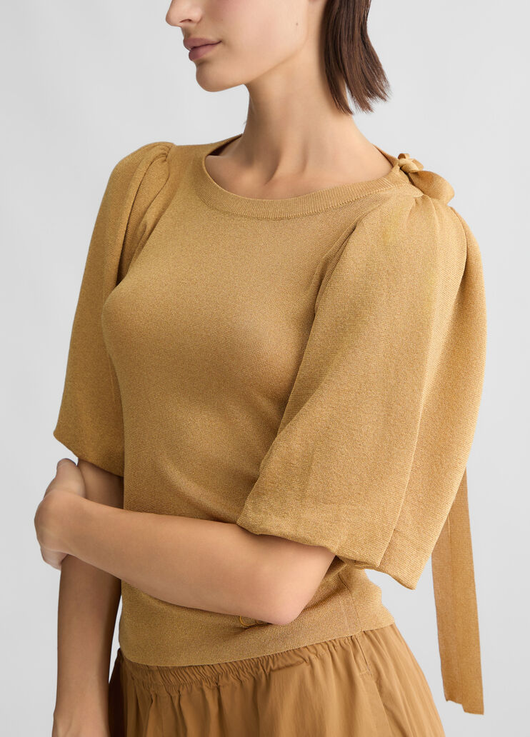 Gold top with cut-out detailing