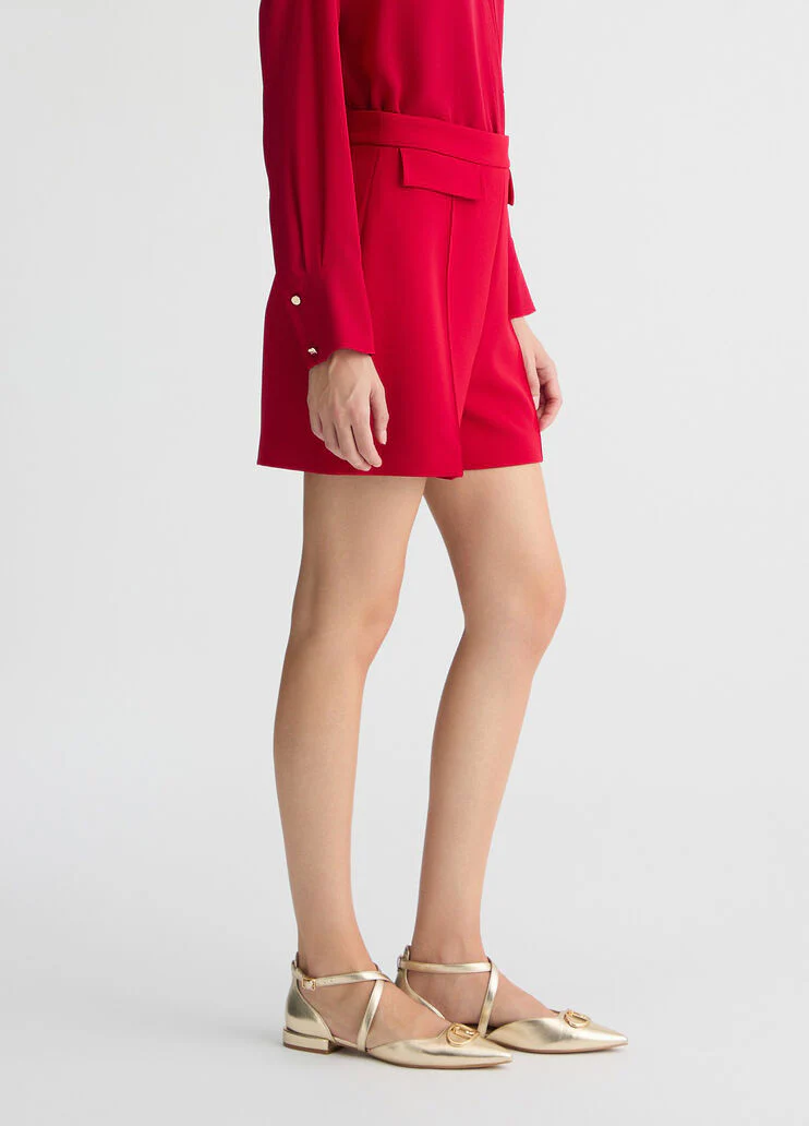 Red high-rise shorts