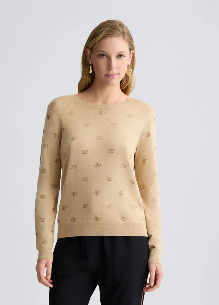 Top with logo and gemstones