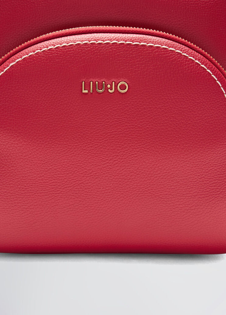 Tumbled backpack with clutch bag