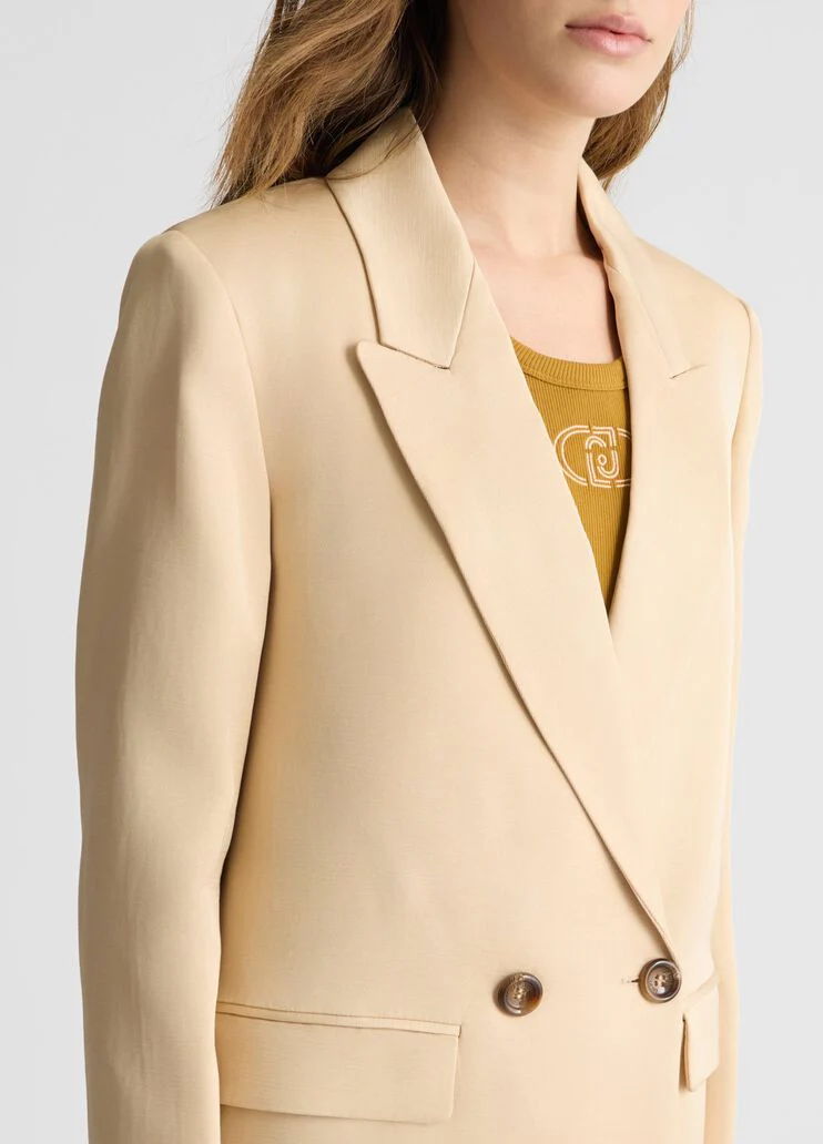 Double-breasted beige blazer